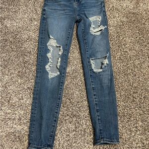 Distressed Blue Jeans